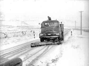 Clearing snow at Holme Moss 	