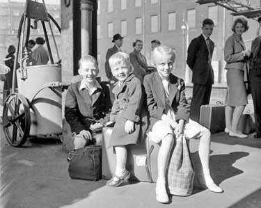 Holidaymakers at Huddersfield Station 	
