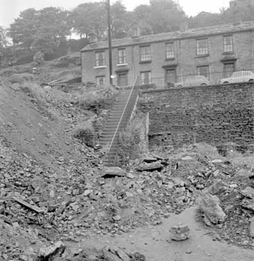 Land slide covering footpath, from Paddock to Stoney Battery Road 	