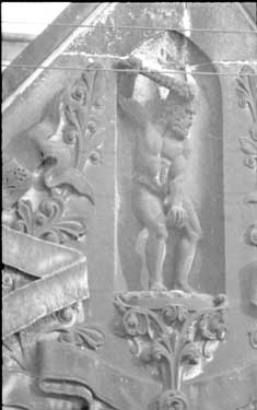 Pictures of - Old Huddersfield Athletic Club Head Quarters - detail of carved figure above main doors 	