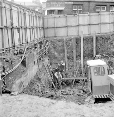 Pictures Story - hole where Woolworths now stands, of Victoria Lane 	