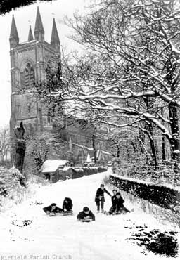 Mirfield Parish Church in snow