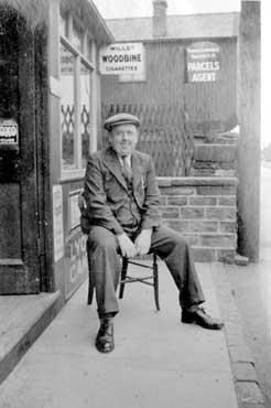 Arnold Lockwood, Postman, outside Jack Cartwright's Shop, Town End, Shelley