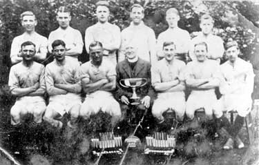 Kirkheaton Football team: back row from left Wilf Lockwood, Frank Sykes, Heffor, Sandland, Ted Hitchcock, Tommy Bates. Front row from left Frank Dyson, Frank Whitworth, Rev Moore, Reg Machin, far righ