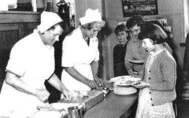 Emley First School: kitchen staff, Marion Walker on left and Mrs Sowerby serving dinners at lunch time