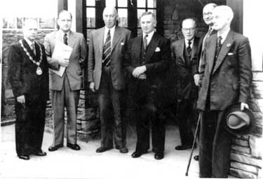 Opening of Village Garden, Emley: from L to R, Mr H Fox, Lord Savile, Col. G Taylor, Mr M Exley, Mr H Mountain, Mr P Renshaw, Mr C Littlewood. A total of ?375 had been raised by the Festival of Britai