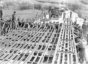 National Service: 28 Field Squadron Royal Engineers building Bailey Bridge, Salisbury Plain
