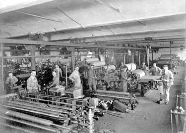 John Haigh & Sons Ltd: Portion of Erecting Shop (note timber block floor), with Douglas Hardy 1st left, Jack Greaves 4th from right, Eric Beaumont 2nd from right