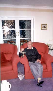 Harold Laycock with football trophies (for Kim Strickson Project)