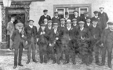 Group of men gathered outside a pub, Cleckheaton