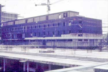 Construction of the Huddersfield Royal Infirmary - west side viewed from foot path
