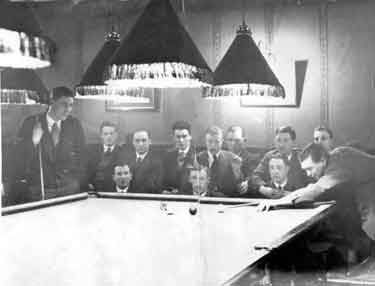 Huddersfield Town team playing snooker