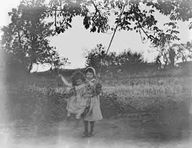Colwyn Bay, Rhos, May and little girl on swing