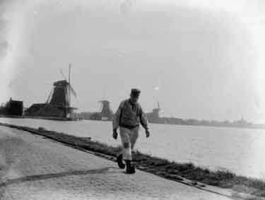 Zaandam, man walking and windmill