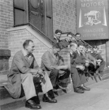 Brook Motors Limited: staff sitting outside