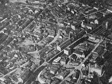 Areal View of Brighouse - the building with the tower in the centre of the photograph is Park United Methodist Church, and lower down in Bethel Street is the Municipal Offices. 