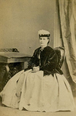 Portrait of a Woman, Seated by a Desk. 