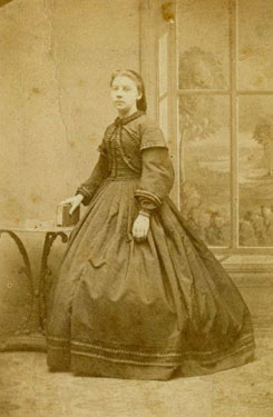 Portrait of a young woman holding a book. (Mrs Limpton)