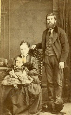 Portrait of a Mr and Mrs (Edith) Hansfield with their young toddler who was born in 1874, and was known as Mattie.