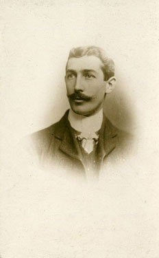 Portrait of a man with a moustache.