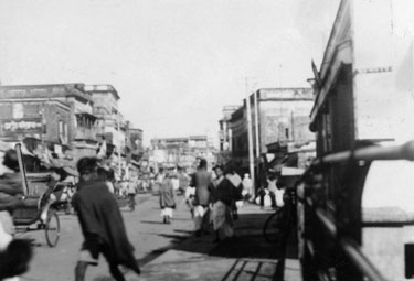 Wartime Archive of Reg Stone of Skelmanthorpe: Town Skyscrapers, a street in Dacca (Dhaka), East Bengal.