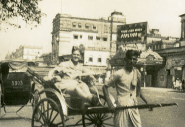 Wartime Archive of Reg Stone of Skelmanthorpe: Reg Stone flies to Calcutta West Bengal, India. Photograph taken whilst travelling on Chowringhee’s main Street.