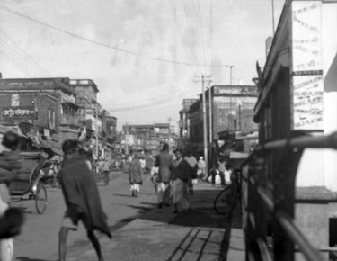 Royal Air Force 1543805 R.O. Stone East Bengal and Burma 1943-1946: Black and White Negatives of various photographs taken over that period – A street in Dacca (Dhaka), East Bengal. 
