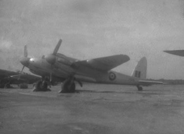 Royal Air Force 1543805 R.O. Stone East Bengal and Burma 1943-1946: Black and White Negatives of various photographs taken over that period – Two Mosquito and two Spitfires Fighter planes at Mingaladon Airfield, Rangoon, Burma.