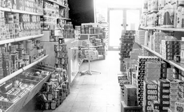 Album containing the various retail outlets currently/once owned by Mrs Duff's Family - Morton's Family Grocers - Goose Green, Wigan - interior shot
