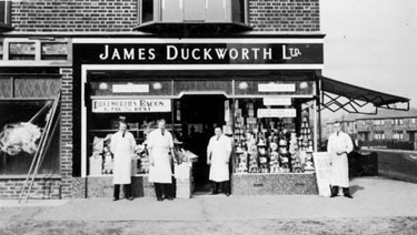 Album containing the various retail outlets currently/once owned by Mrs Duff's Family - James Duckworth Ltd. - No. 196 Church Road, Urnston, Flixton, North Yorkshire (men in photograph: ?, J. Smethurs