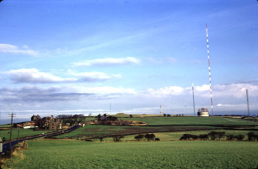 Emley Moor Mast - Work has started on the building of the new concrete mast. Viewed from Carr Cottages, Drinker Lane (Note: the temporay mast built by Scandinavian Co.).