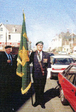 Burma Star Association Reunion and Annual General Meeting - Standing with flag outside St. John's Church, Blackpool.