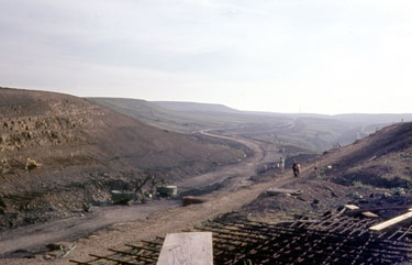 The construction of the first segment of the Yorkshire section of the M62 motorway, situated between the county boundary of Saddleworth Moor and Outlane - Deadhead cutting.