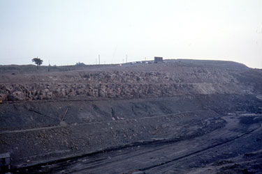 The construction of the first segment of the Yorkshire section of the M62 motorway, situated between the county boundary of Saddleworth Moor and Outlane - Deadhead cutting.