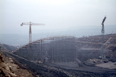 The construction of the first segment of the Yorkshire section of the M62 motorway, situated between the county boundary of Saddleworth Moor and Outlane - Scammonden Bridge, the centering of the arch aided by scaffolding.