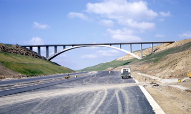The construction of the first segment of the Yorkshire section of the M62 motorway, situated between the county boundary of Saddleworth Moor and Outlane - Scammonden Bridge.