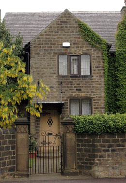  No.90, Birkby Lodge Road "Azo House" - on the corner of Birkby Lodge Road and Birkby Hall Road, Huddersfield. This house was designed by Edgar Wood (1860–1935) a noted Arts and Crafts architect who practised from Manchester. Other designs by him included Lindley Clock Tower and Banney Royd. Note the canopy above the doorway - a Wood trademark. 