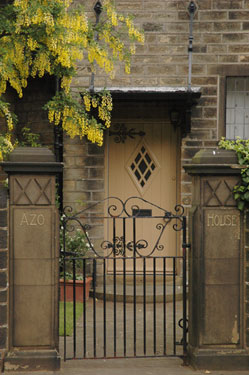 Doorway to no.90, Birkby Lodge Road "Azo House" - on the corner of Birkby Lodge Road and Birkby Hall Road, Huddersfield. This house was designed by Edgar Wood (1860–1935) a noted Arts and Crafts architect who practised from Manchester. Other designs by him included Lindley Clock Tower and Banney Royd. Note the canopy above the doorway - a Wood trademark.