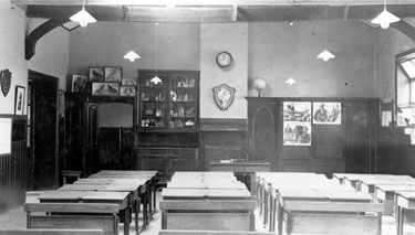 Newsome National School — Interior view of the main schoolroom. This room could be divided into two by a wooden partition with glass windows, which folded along a track and was secured by bolts.
