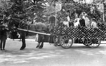 Armitage Bridge's Celebration of the Coronation of King George V – Horse drawn float carrying the Queen (Miss Marjorie Haigh) and her many attendants. 