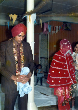 Mr and Mrs Ajaib Praying during their Wedding Ceremony at the Old Sikh Temple, Bath Street, Huddersfield.