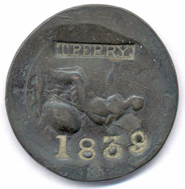 A bronze George III 1799 pattern (probably) halfpenny coin which has been adapted in order to produce a love token; on the reverse side the name T Perry has been stamped, with the date 1839; the obverse has been left in its original, though very worn, state.