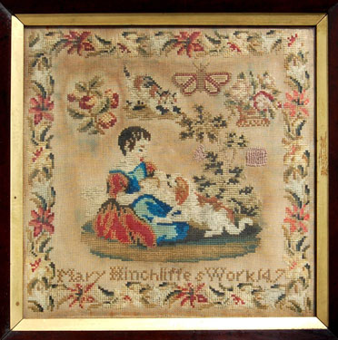 A framed sampler signed Mary Hinchliffe; it depicts a girl with a small dog. It belonged to a woman who was drowned in the 1944 Whitsuntide Holmfirth Flood, and was purchased in the sale of her effects. The two women who died in the flood were Miss Maud Wimpenny and Mrs D Schofield.