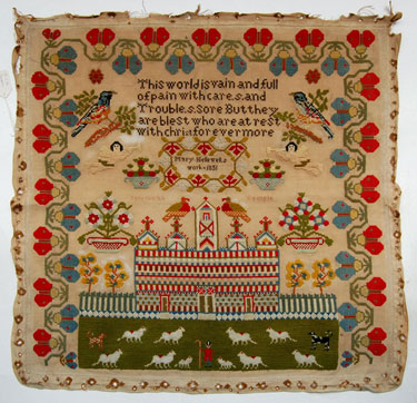 An unframed sampler signed Mary Helliwell 1851. Moral verse, cherubs, Solomon's Temple, birds, flowers, sheperds, flock of sheep, dogs. 