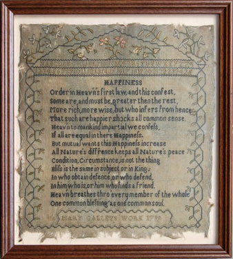 A framed sampler signed Mary Calley 1799. Alphabet and numbers with verse on 'Happiness'. Border of flowers and leaves.
