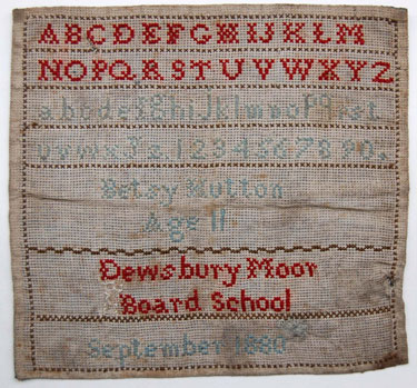 An unframed sampler made by Betsy Hutton aged 11 at Dewsbury Board School, West Yorkshire, September 1880; with alphabet and numbers.