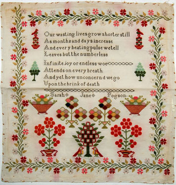An unframed sampler signed Miss Sarah Jane Pogson from 1840 to 1870. Featuring birds, flowers, baskets, trees and moral verse.