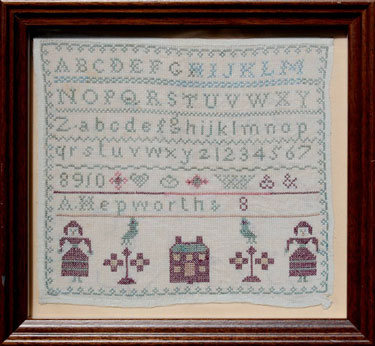 A framed sampler signed A. Hepworth, aged 8. Alphabet, numbers and along the bottom two girls, two birds in bushes, either side of a house.
