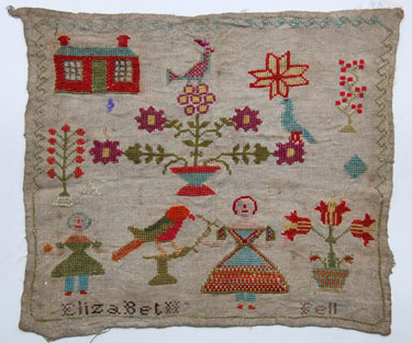 An unframed sampler made by Elizabeth Fell, 1850 - 1875; with two girls, flowers, birds and a house.