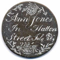 View: ka00006 A bronze George III, first issue halfpenny coin which has been polished on one side in order to produce a love token; on one side is the name Ann Jones with the date July 28th 1772 (which was a Tuesday), on the other side is the original obverse.